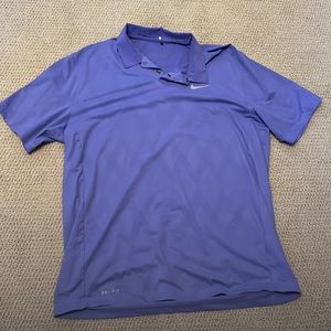 Nike golf polo. Tiger woods. Small 2 spot stain on the shoulder. May come out.